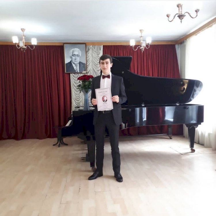 Magna cum laude pentru pianistul Pavel Savciuc